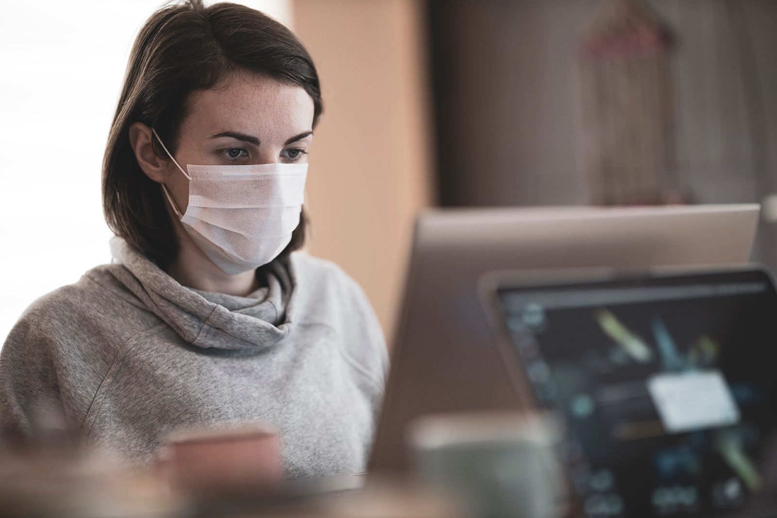 Cannabis patient wearing a mask and placing an online cannabis order with Terrasana